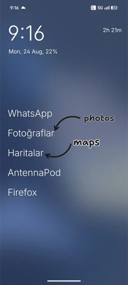 My Android home screen: Olauncher with a blue wallpaper and only a few text app names